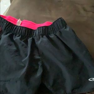 Black with hot pink underlay on the sides.